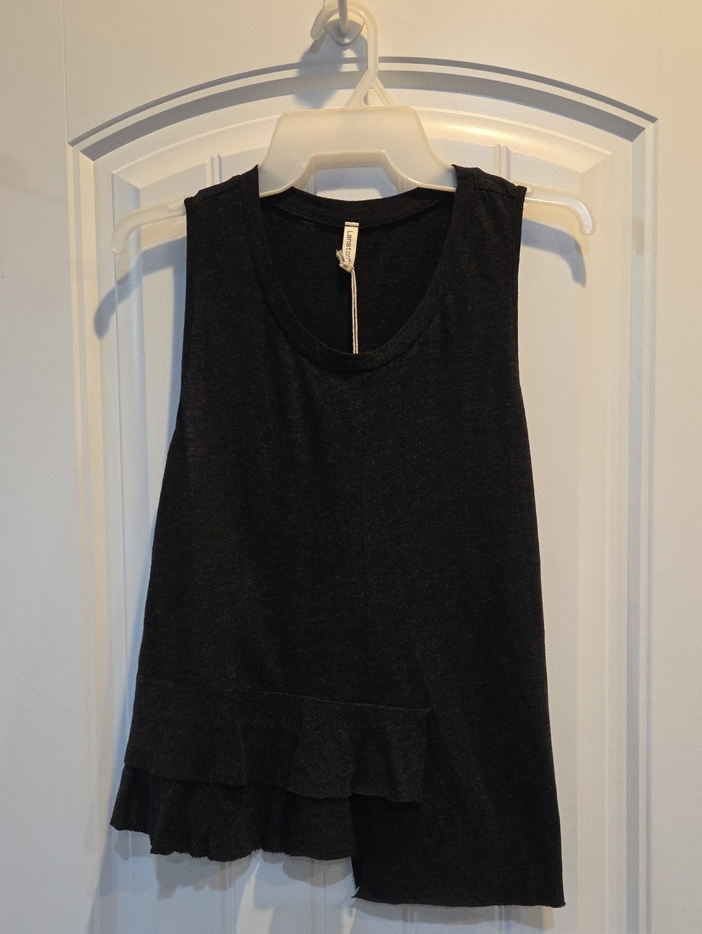 Black Sleeveless Tank with Asymmetrical Ruffle Hem